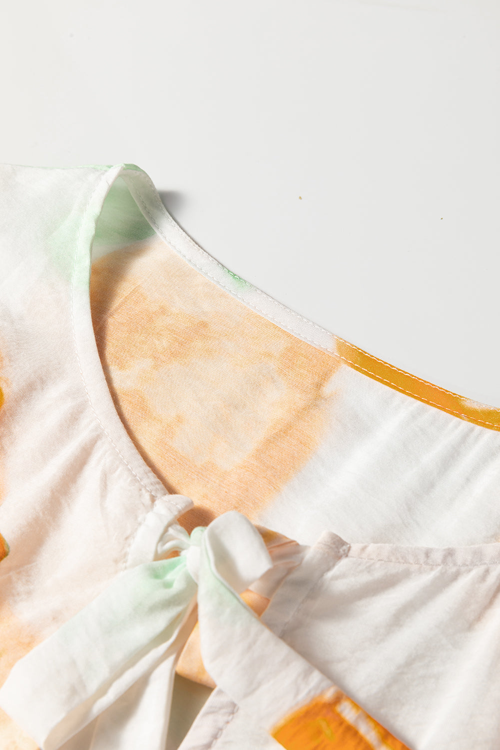 Carrot Abstract Print Bubble Sleeve Bow Front Top